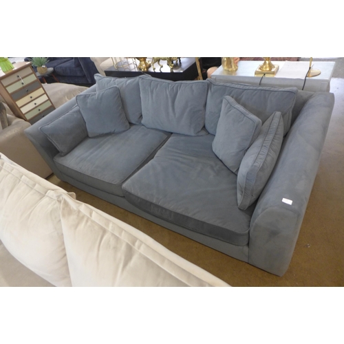 1305 - A steel blue velvet three seater sofa