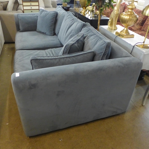 1305 - A steel blue velvet three seater sofa