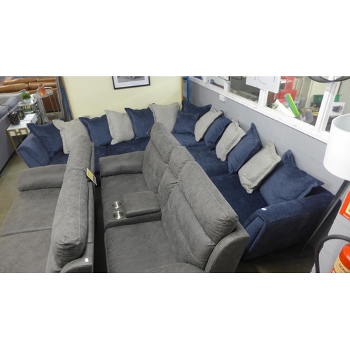 1375 - A large blue velvet corner sofa with reversible seat cushions