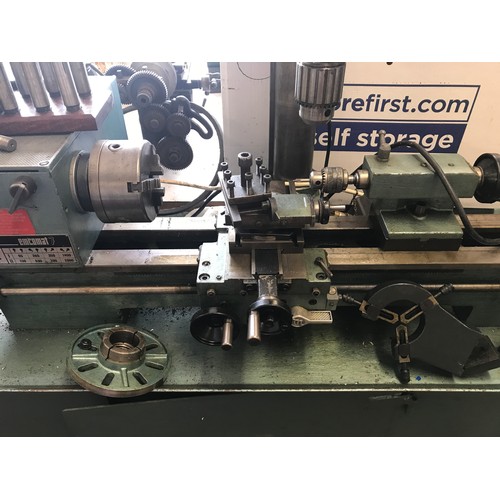 2083 - Myford/Emcomat 7 lathe machine on enamelled stand with pillar drill attachment, instructions