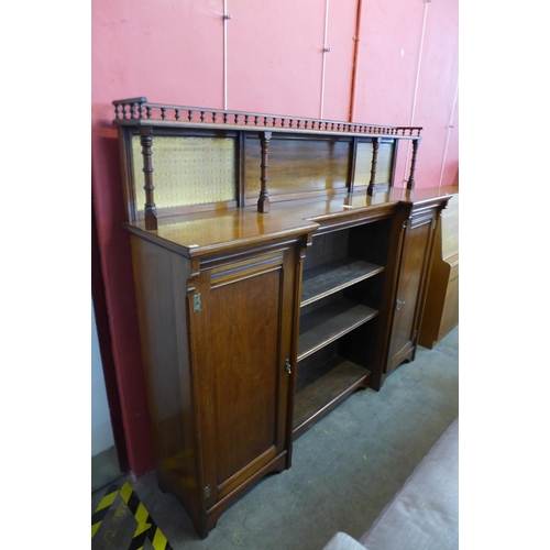 22 - A Victorian Aesthetic Movement walnut breakfront bookcase