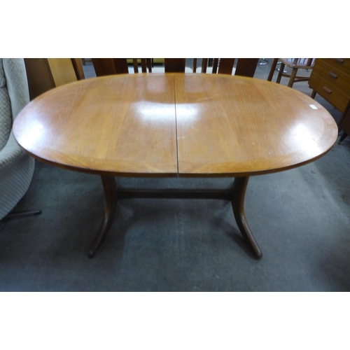 72 - A Nathan teak extending dining table