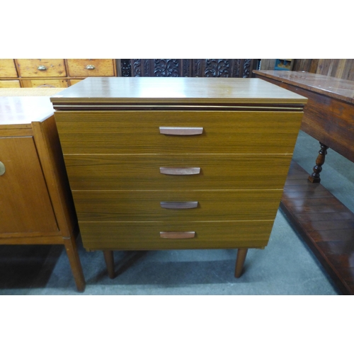 76 - A teak chest of drawers