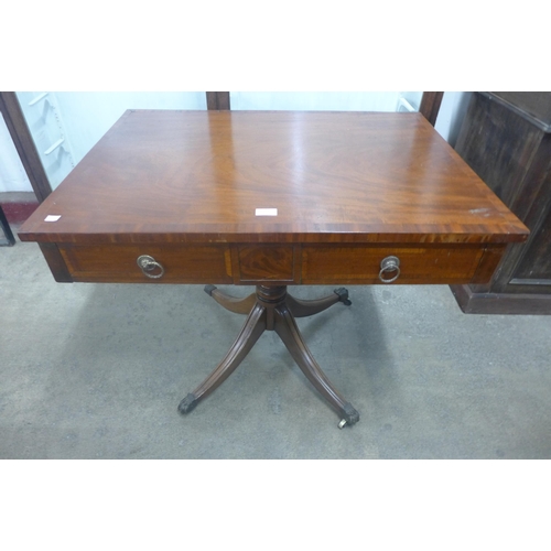 230 - A George IV mahogany two drawer library table