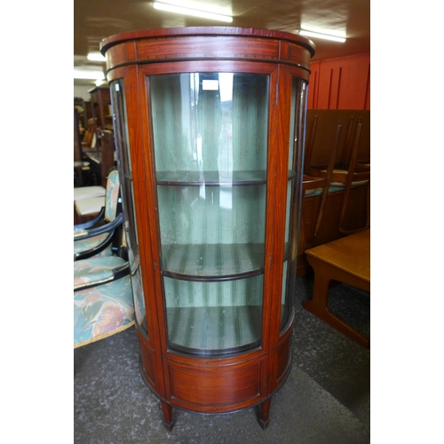 129 - An Edward VII satinwood demi-lune display cabinet