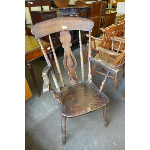 132 - A Victorian elm and beech farmhouse armchair