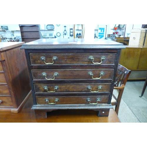 142 - An apprentice's/miniature mahogany chest of drawers