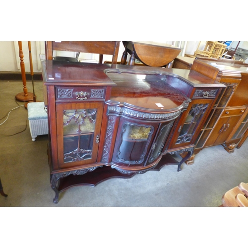 187 - An Edward VII carved mahogany side cabinet