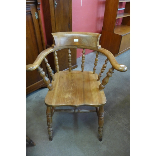 20 - A Victorian beech and elm smokers bow chair