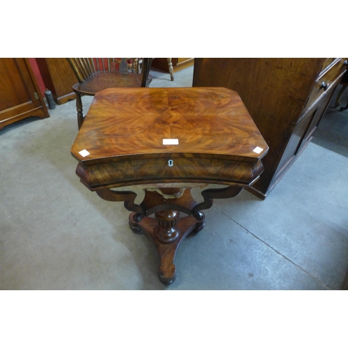 23 - A George IV mahogany lady's sewing table