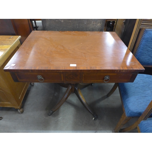 230 - A George IV mahogany two drawer library table