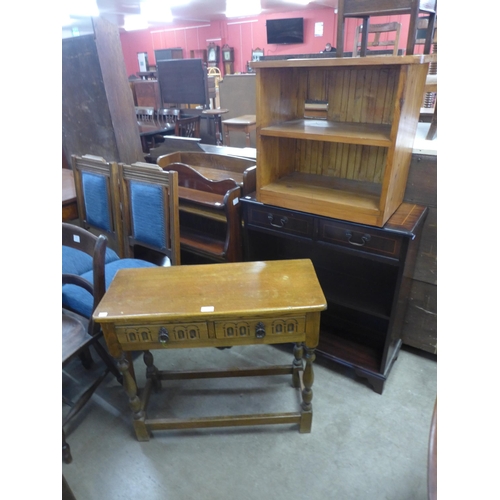 231 - An oak hall table, two open bookcases, an elm drop-leaf table, chairs, etc. (10)