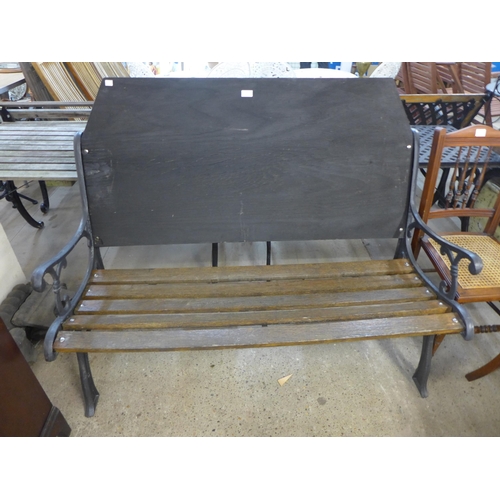 253 - A cast iron ended garden bench