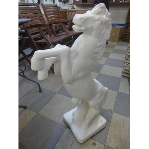 260 - A concrete figural rearing horse