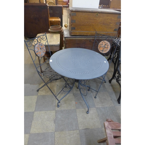 268 - An alloy garden table and two chairs