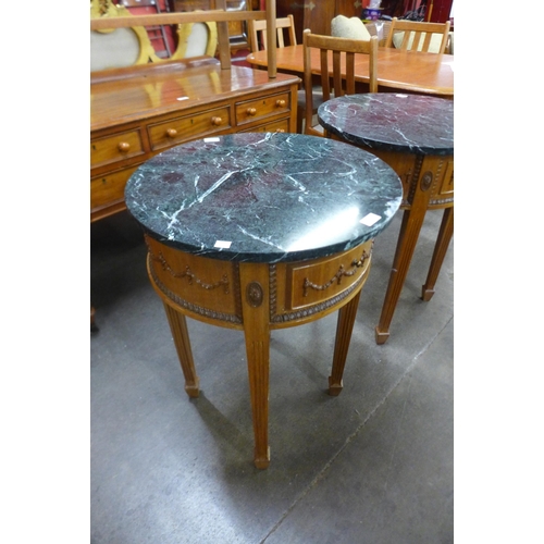 27 - A pair of French style mahogany and marble topped gueridon tables