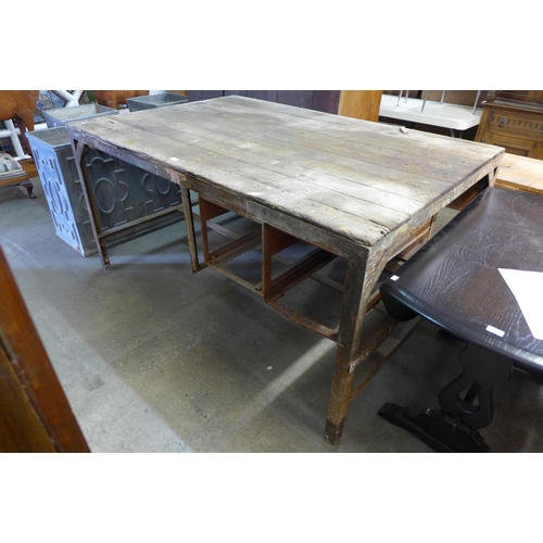 270 - A large industrial steel framed work bench