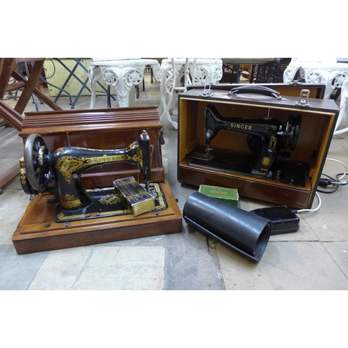 281 - Two cased Singer sewing machines