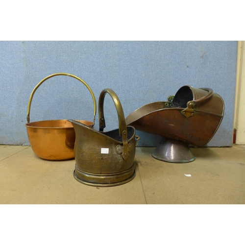 282 - A Victorian copper and brass jam pan, a copper coal scuttle and another