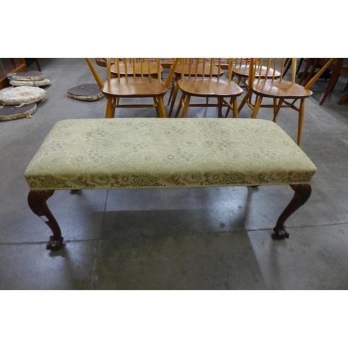 31 - A Chippendale Revival mahogany and fabric upholstered window seat