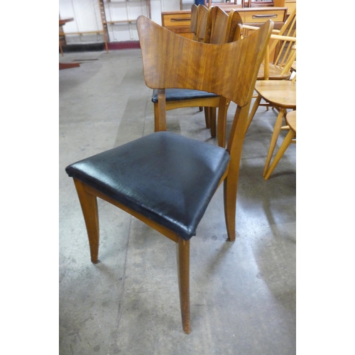 38 - A set of four afromosia dining chairs