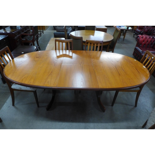 50 - A G-Plan Fresco teak extending table and eight chairs