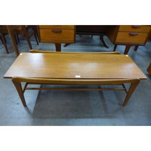 55 - A teak coffee table