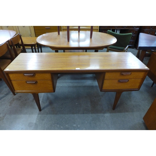 56 - A Younger teak desk