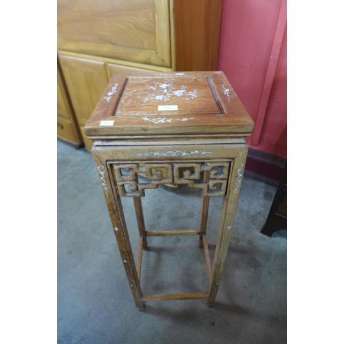 7 - A Chinese hardwood and mother of pearl inlaid jardiniere stand