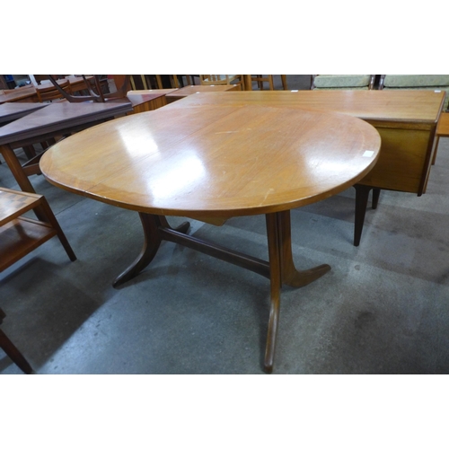 72 - A Nathan teak extending dining table