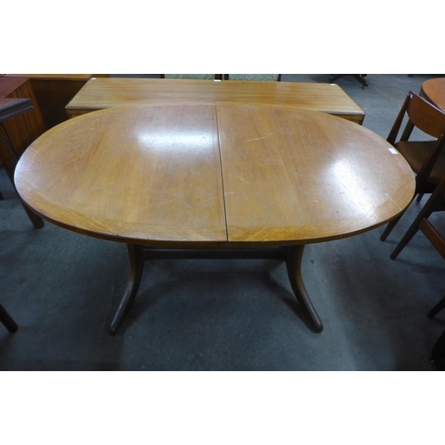 72 - A Nathan teak extending dining table