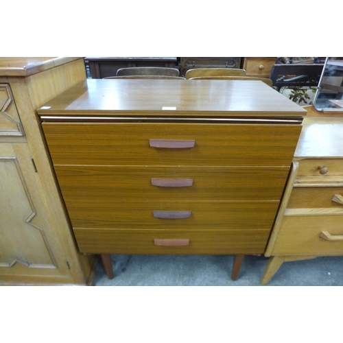 76 - A teak chest of drawers