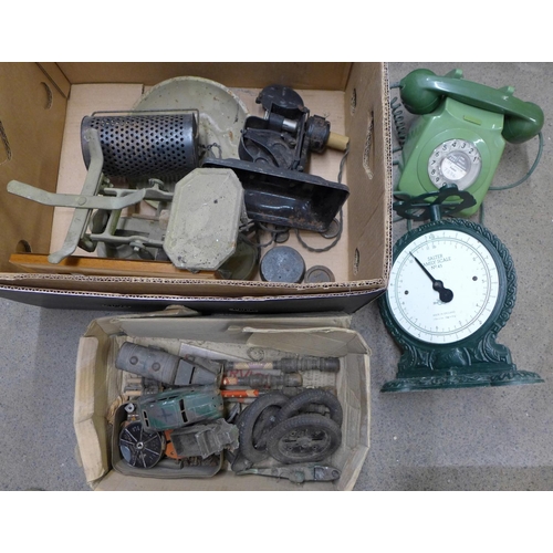 1042 - A box with two vintage telephones, Salter Family scales, vintage toys and wooden pipes