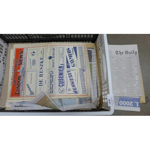 1048 - A box of 20th Century newspapers and ephemera, including Royalty Commemorative and Millennium 1900 a... 