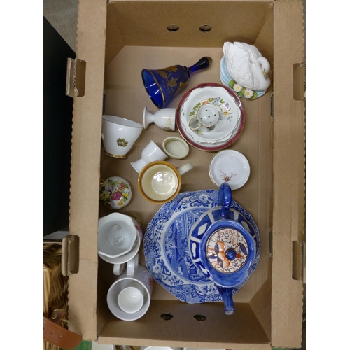 1057 - A box of Royal Family related mugs, a bell, a tin, two boxes of mixed china and a basket of ornament... 