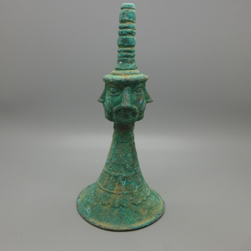 614 - A four faced Verdigris antiquity, 18.5cm