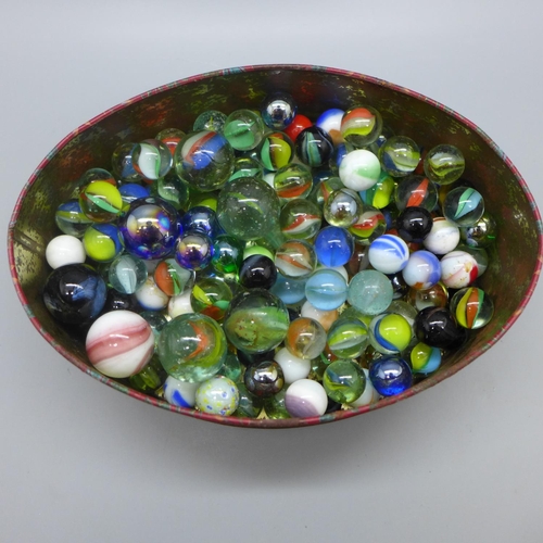 615 - A tin of approximately 140 early to mid 20th Century marbles