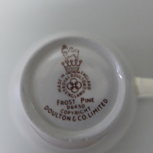 687 - A Royal Doulton Frost Pine coffee set, seven setting