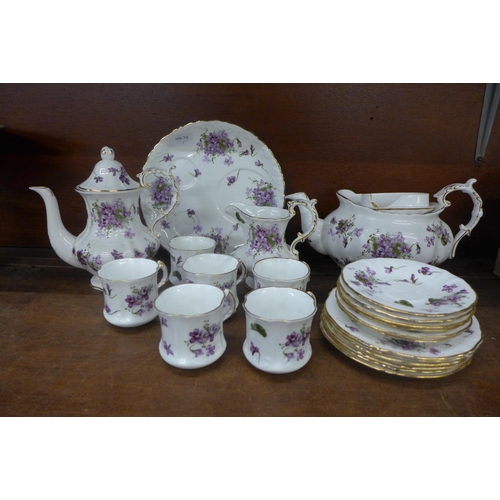 691 - Hammersley Victorian Violets teawares; one cup, milk jug and teapot lid a/f