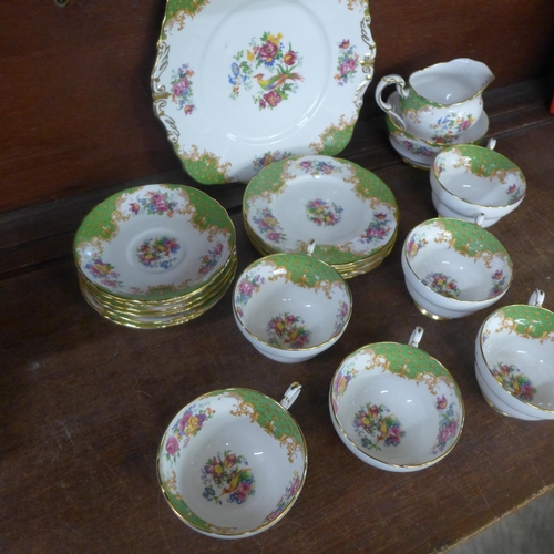 700 - A Paragon Rockingham six setting tea set, one cup with small chip on the rim