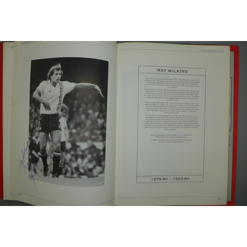 702 - Manchester United; a player by player book containing approximately 97 signatures from former player... 