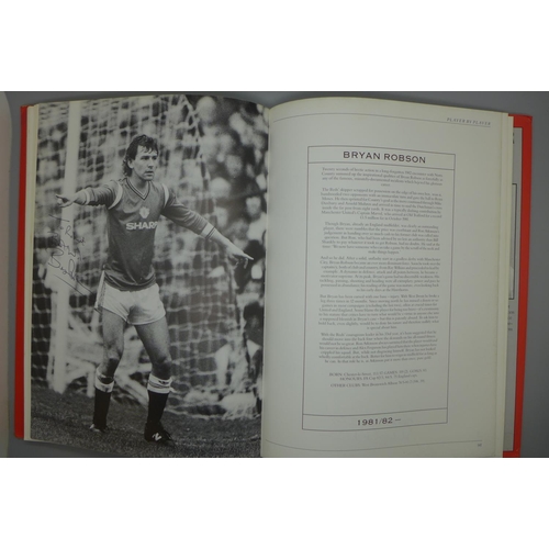 702 - Manchester United; a player by player book containing approximately 97 signatures from former player... 