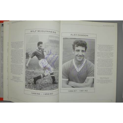 702 - Manchester United; a player by player book containing approximately 97 signatures from former player... 