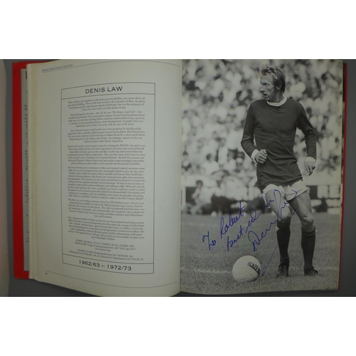 702 - Manchester United; a player by player book containing approximately 97 signatures from former player... 