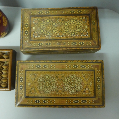 703 - Two Syrian wooden cigar boxes with decorative inlay, a Japanese 15-bar abacus and a wooden Geisha fi... 