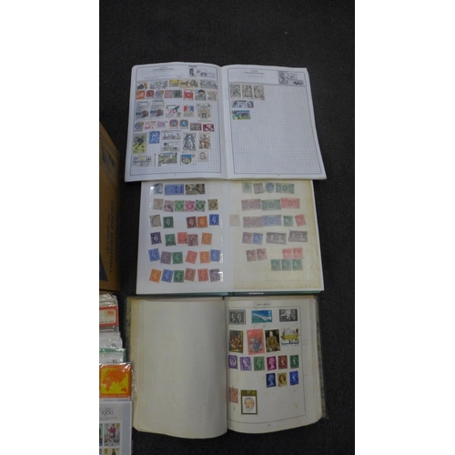 714 - Stamps; a box of stamps, covers, presentation packs, etc.