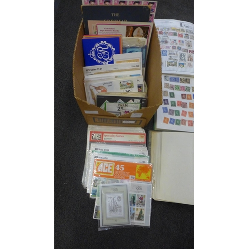 714 - Stamps; a box of stamps, covers, presentation packs, etc.