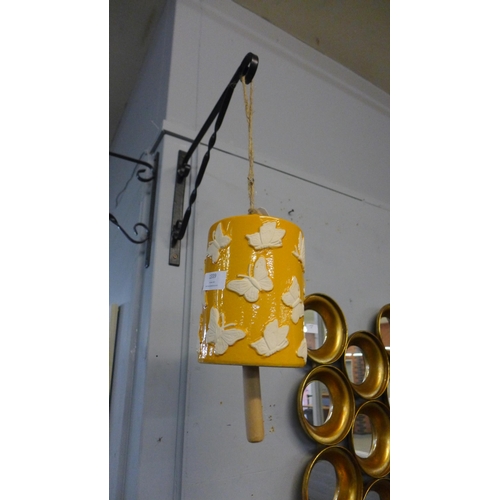 1312 - A yellow ceramic windchime decorated with a butterfly print (7GD22006)   *