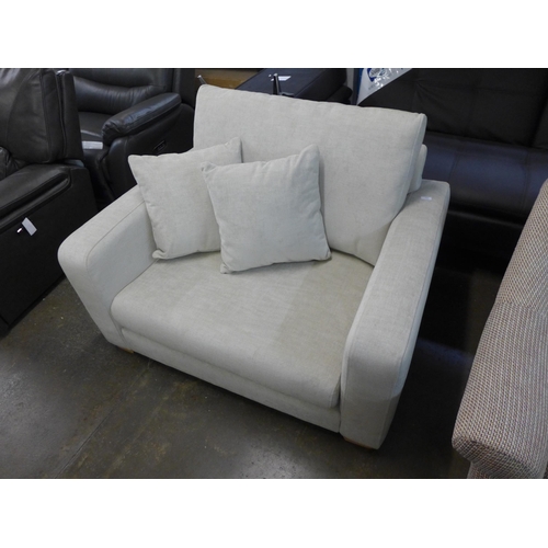 1552 - An ivory upholstered love seat