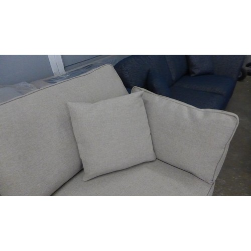 1516 - An Idaho Rubin natural fabric two and three seater sofas